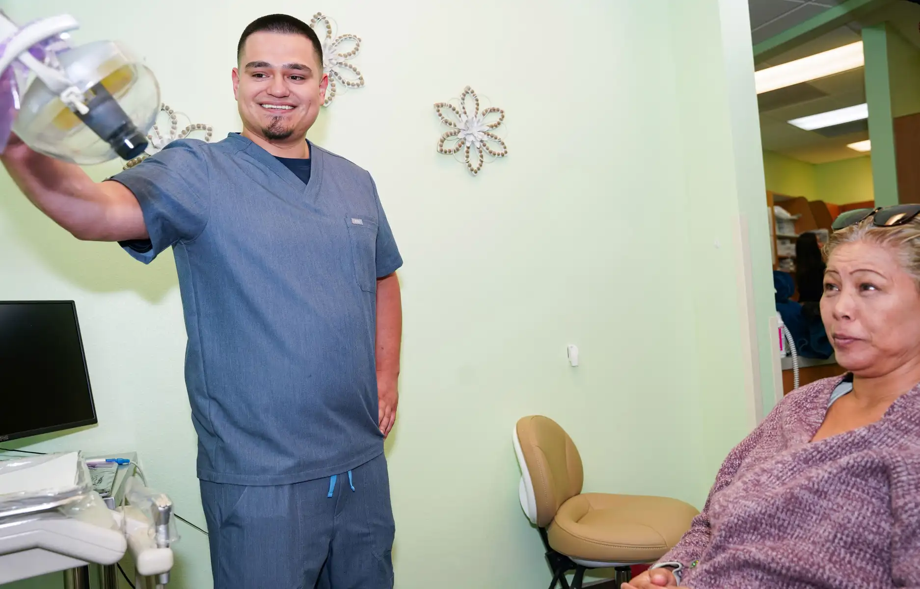 Dental staff and patient