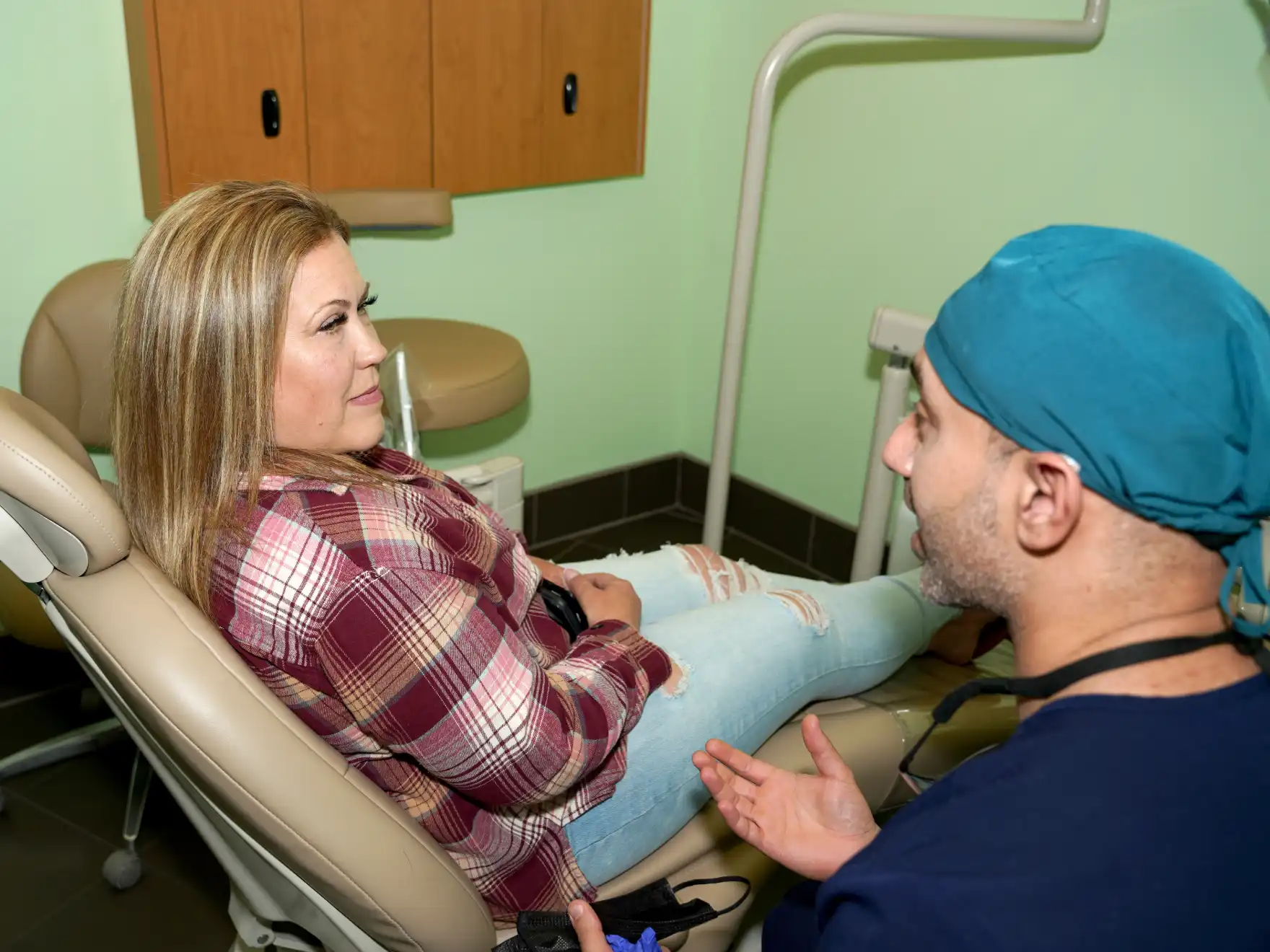 dentist consulting with patient