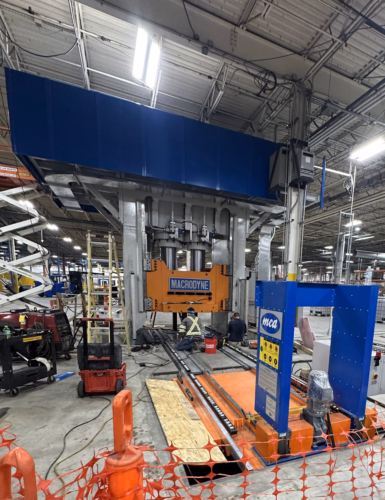 Equipment being lifted within a plant