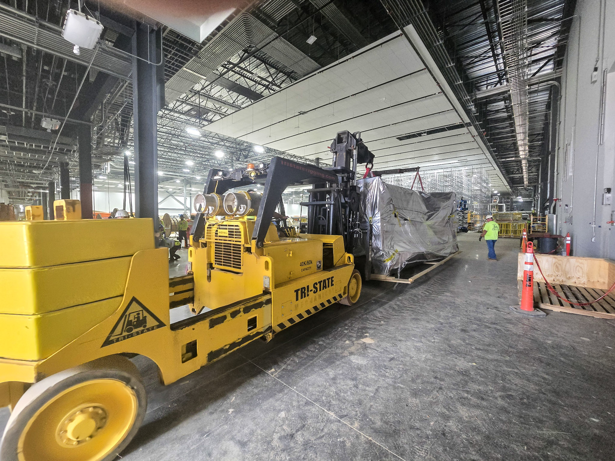 Tri-State Rigging maneuvering a forklift through a facility