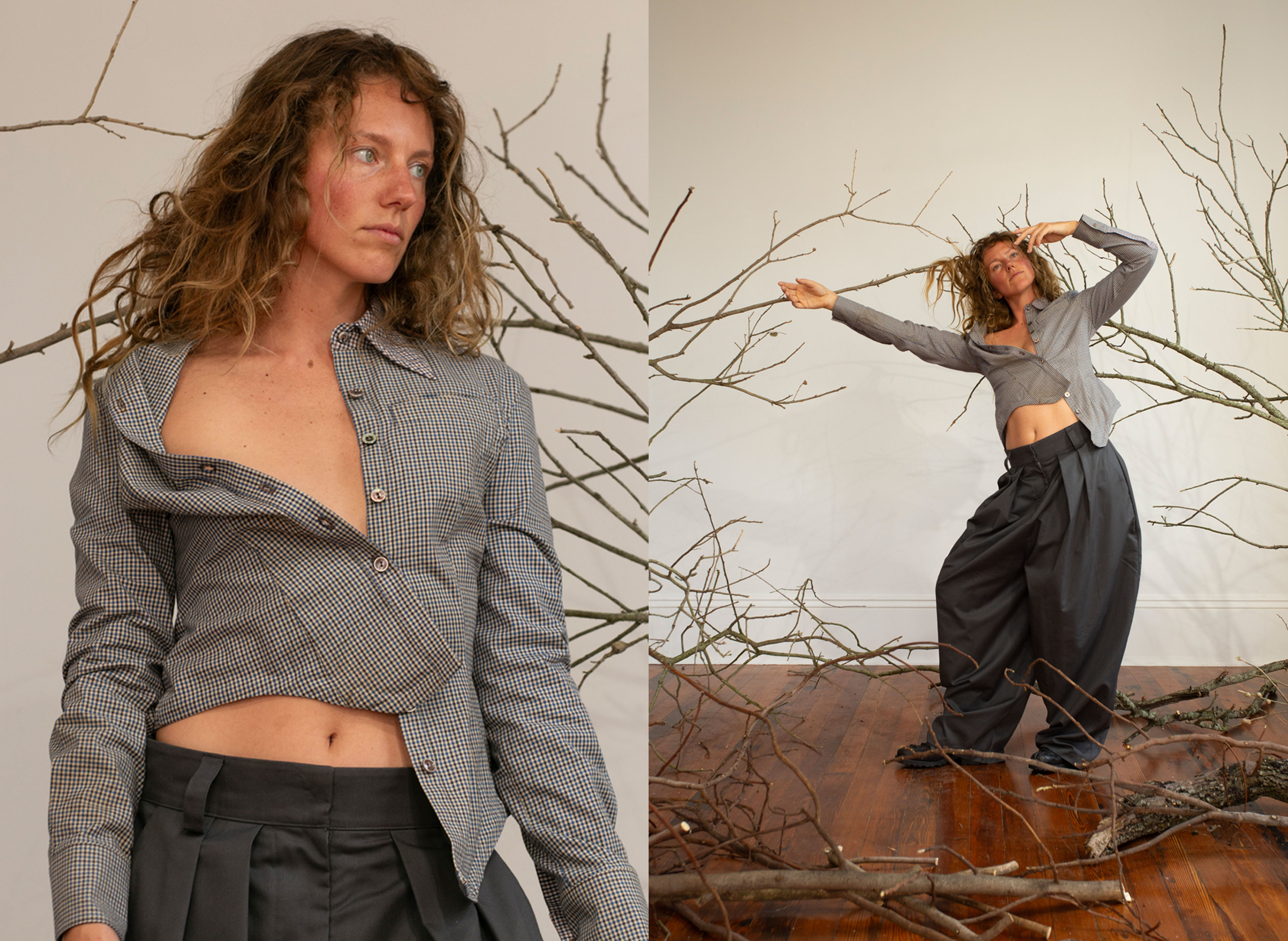 A woman in a plaid button down shirt and loose fitted pants posing 