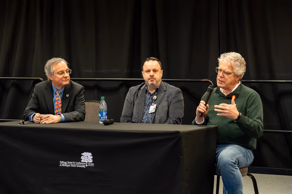 Dean Sousa moderates a discussion with Denny Martin and Benjamin Mosher of E.W. Sparrow Hospital. Photo credit Bryan Esler.