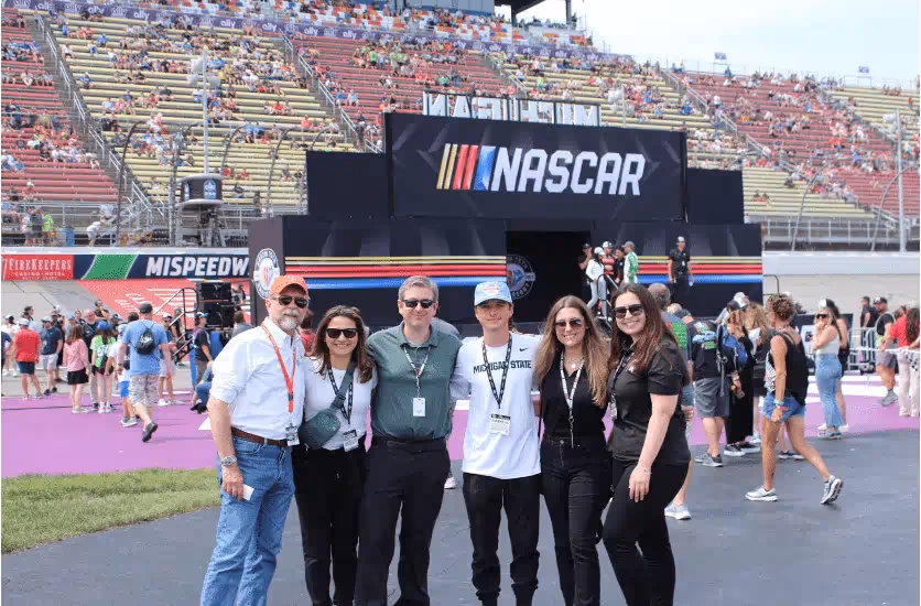 Aiden Davis and his family and a NASCAR race