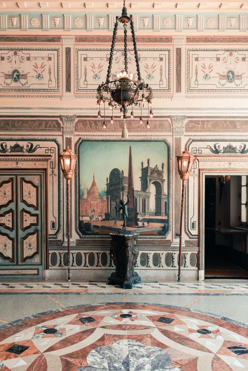 An image of the lounge room in the Mediterranean Chateau.