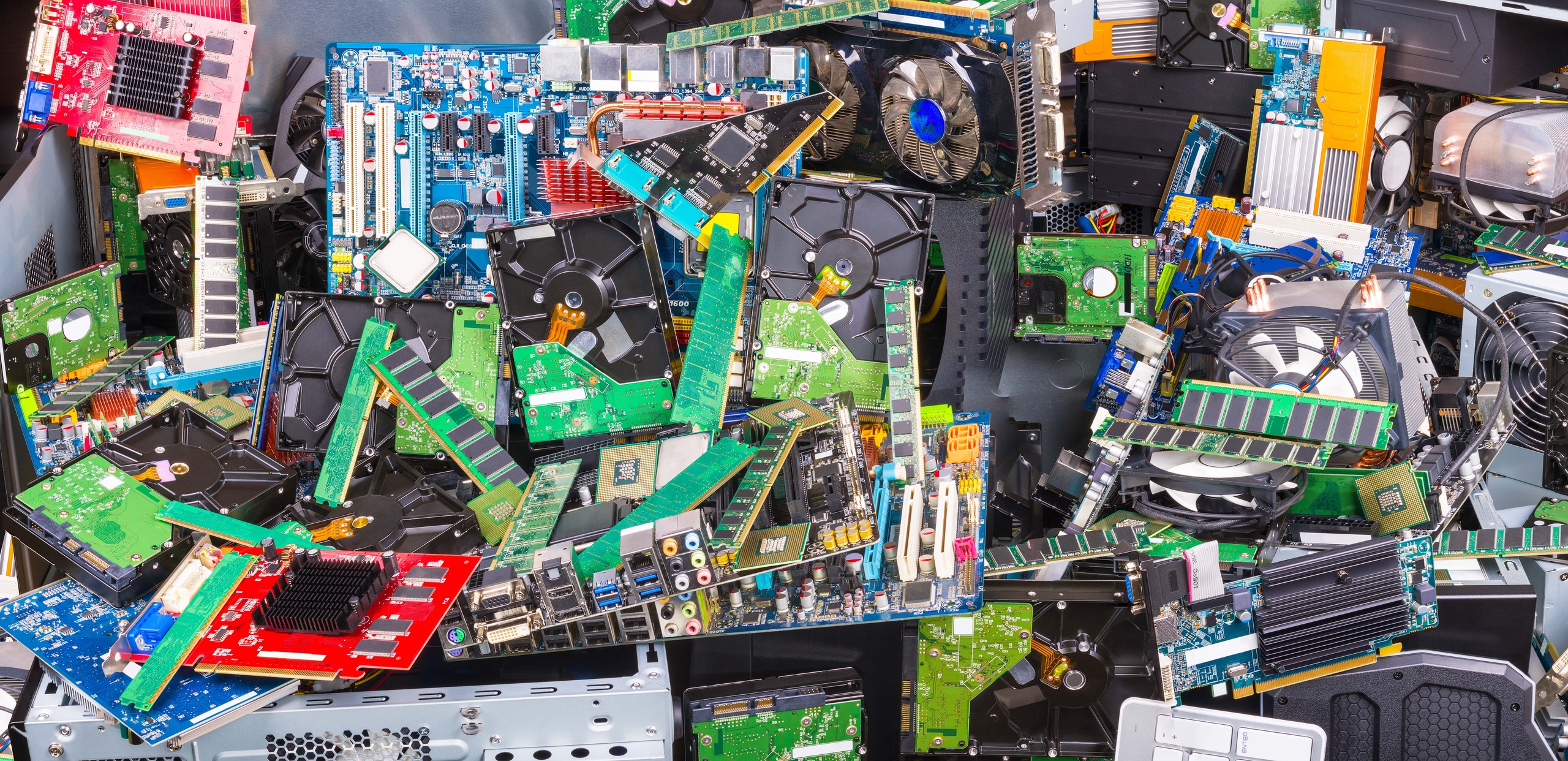 E-waste containing fans, circuitry, ram, and HDDs, waiting to be processed by laptop recycling services in Singapore