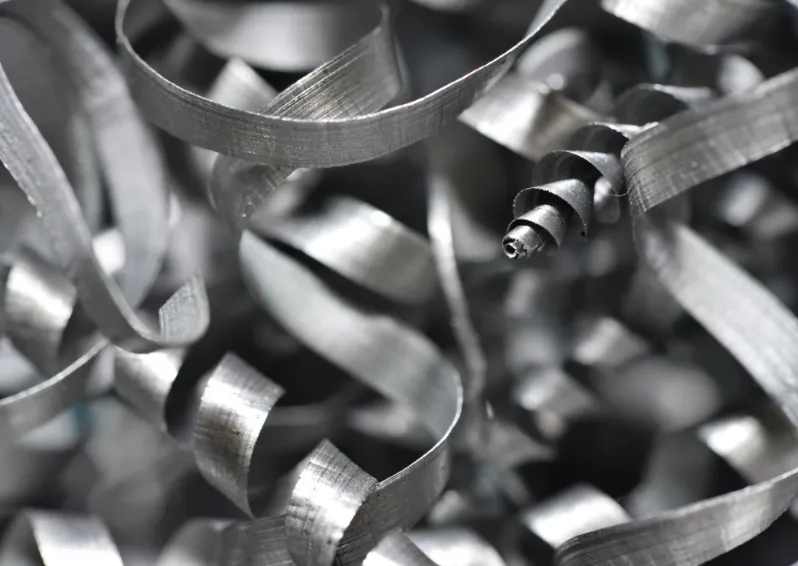 A microscopic shot of metal shavings. Raw metal is one of the yields of laptop recycling services in Singapore