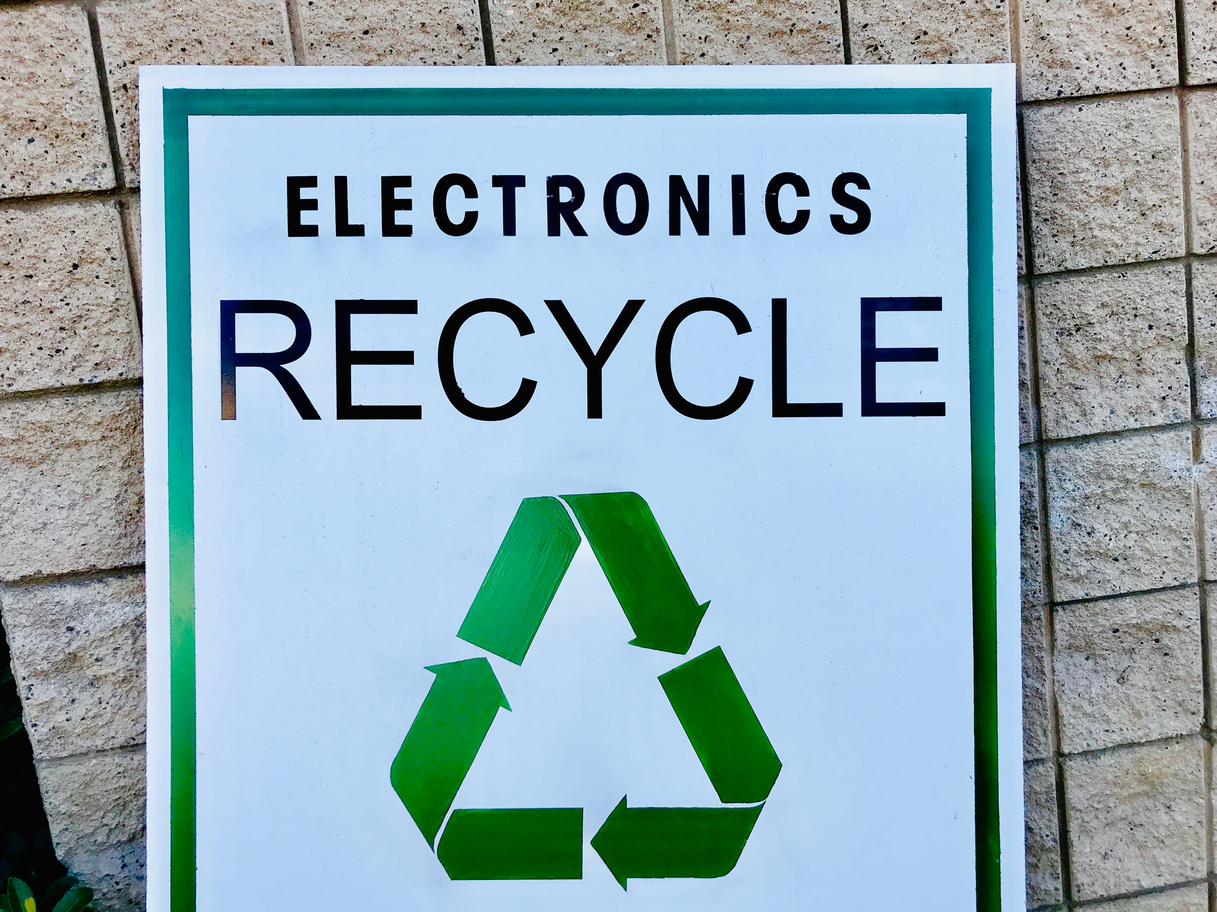 Electronics recycle sign representing an e-waste recycling company in Singapore