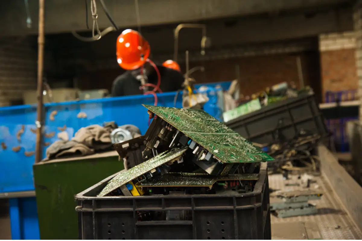 electronics waste in a bin ready for disposal at an e-waste recycling company in Singapore