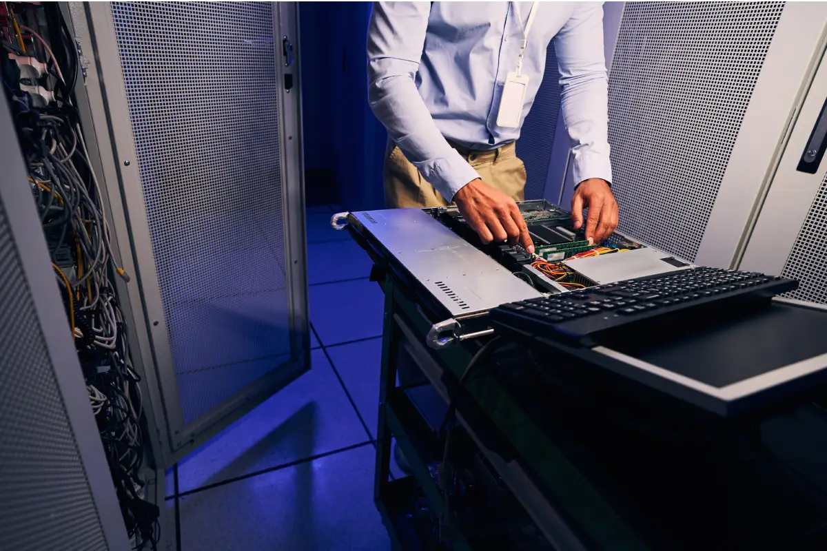 an engineer performing data disposal on retired server as part of ITAD services in Singapore