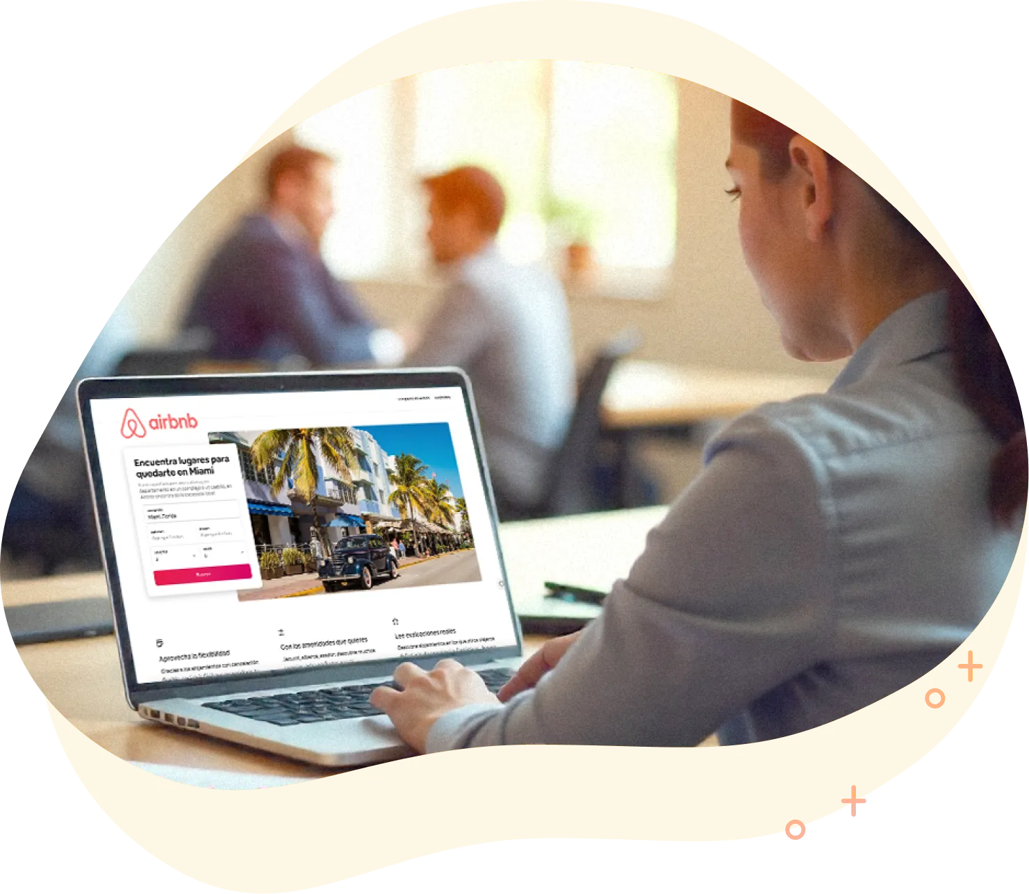 Property manager using a laptop for Airbnb co-hosting and vacation rental management
