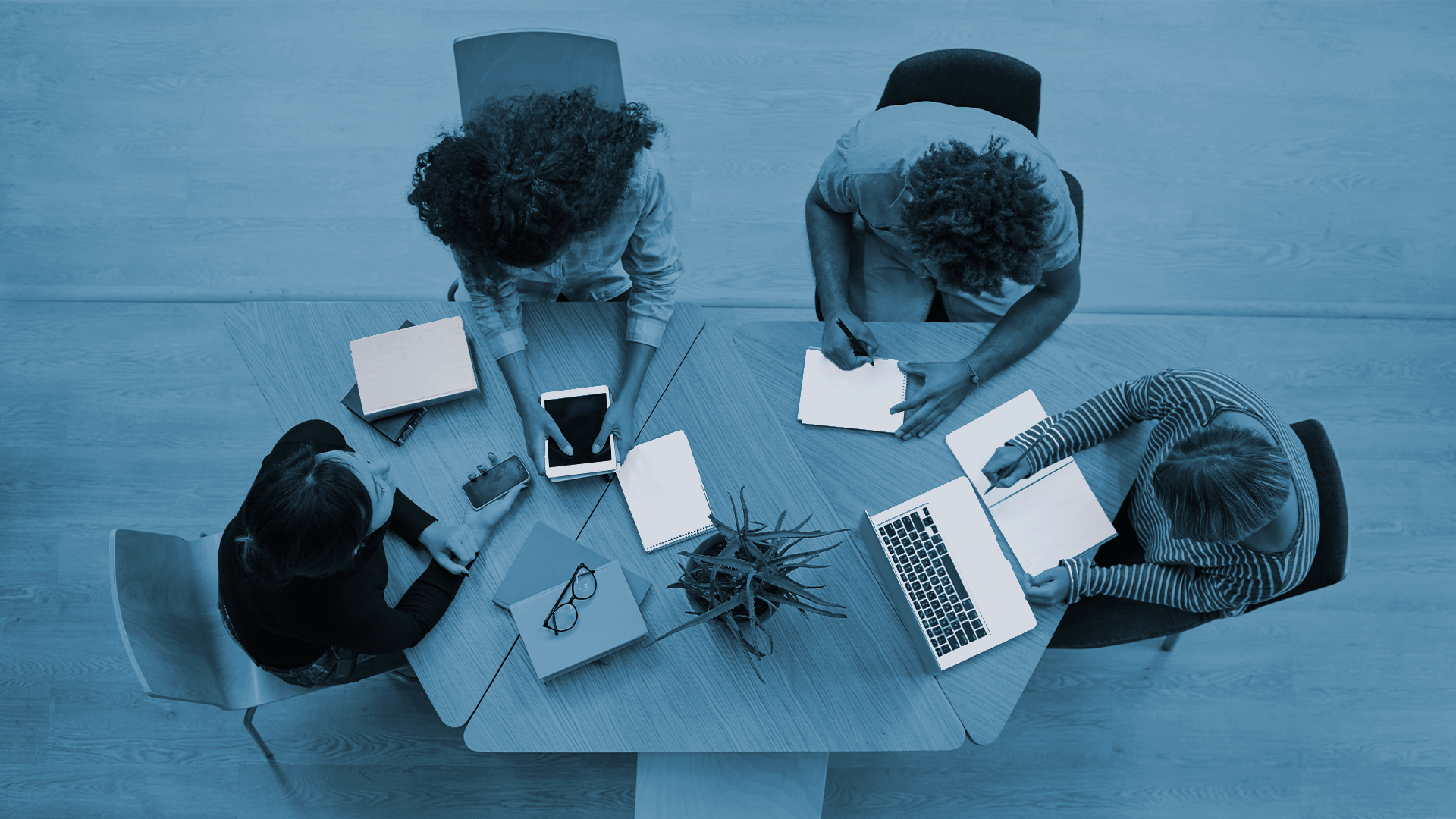 a roundtable with debt collectors having a chat
