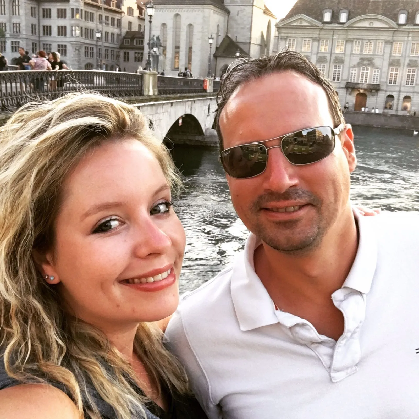 A man with his wife, both smiling