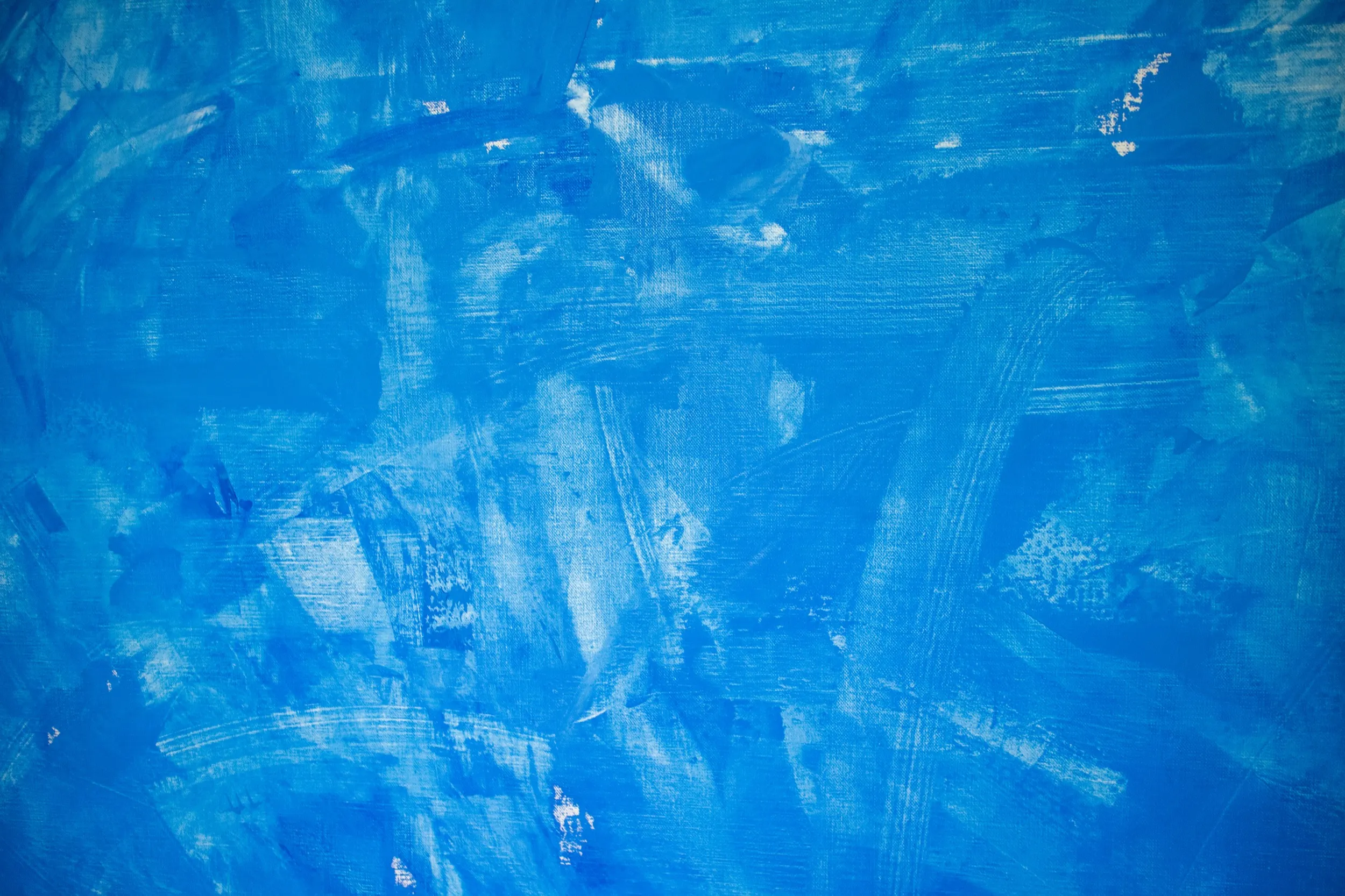 An abstract painting of blue and white colors