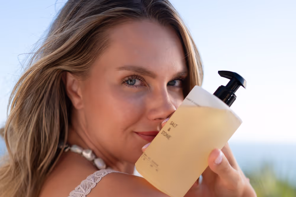 Coconut run on a beach with palm trees and a sunset