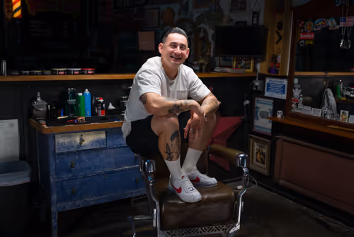 A cinematic image of a barber