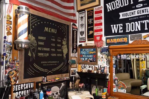 An image of Olds' client's shop displaying their pricing