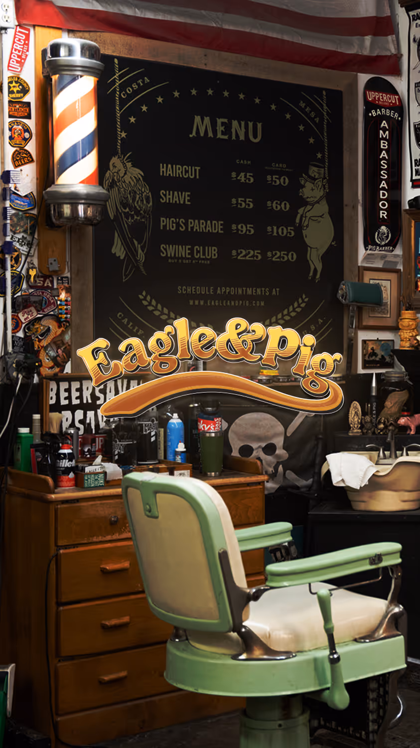Olds' client Eagle & Pig's website website home page hero showing their barbershop with the Eagle & Pig Logo