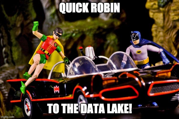 Robin and Batman leggo getting into a car “Quick Robin to the Data Lake!”