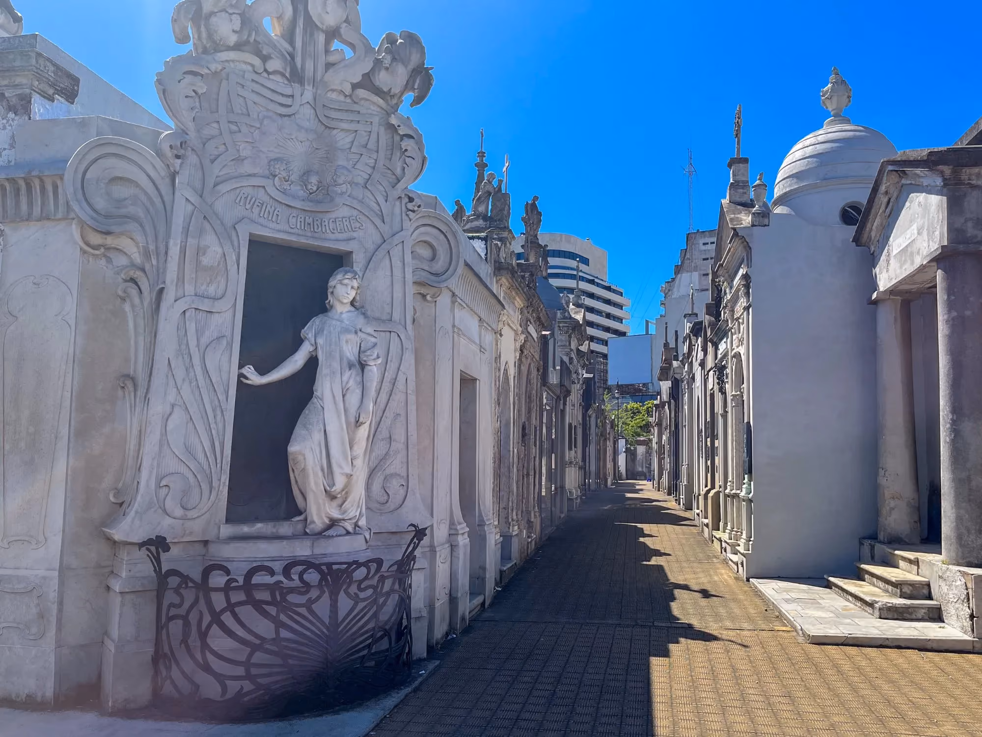 Tomb with statue of young girl out front