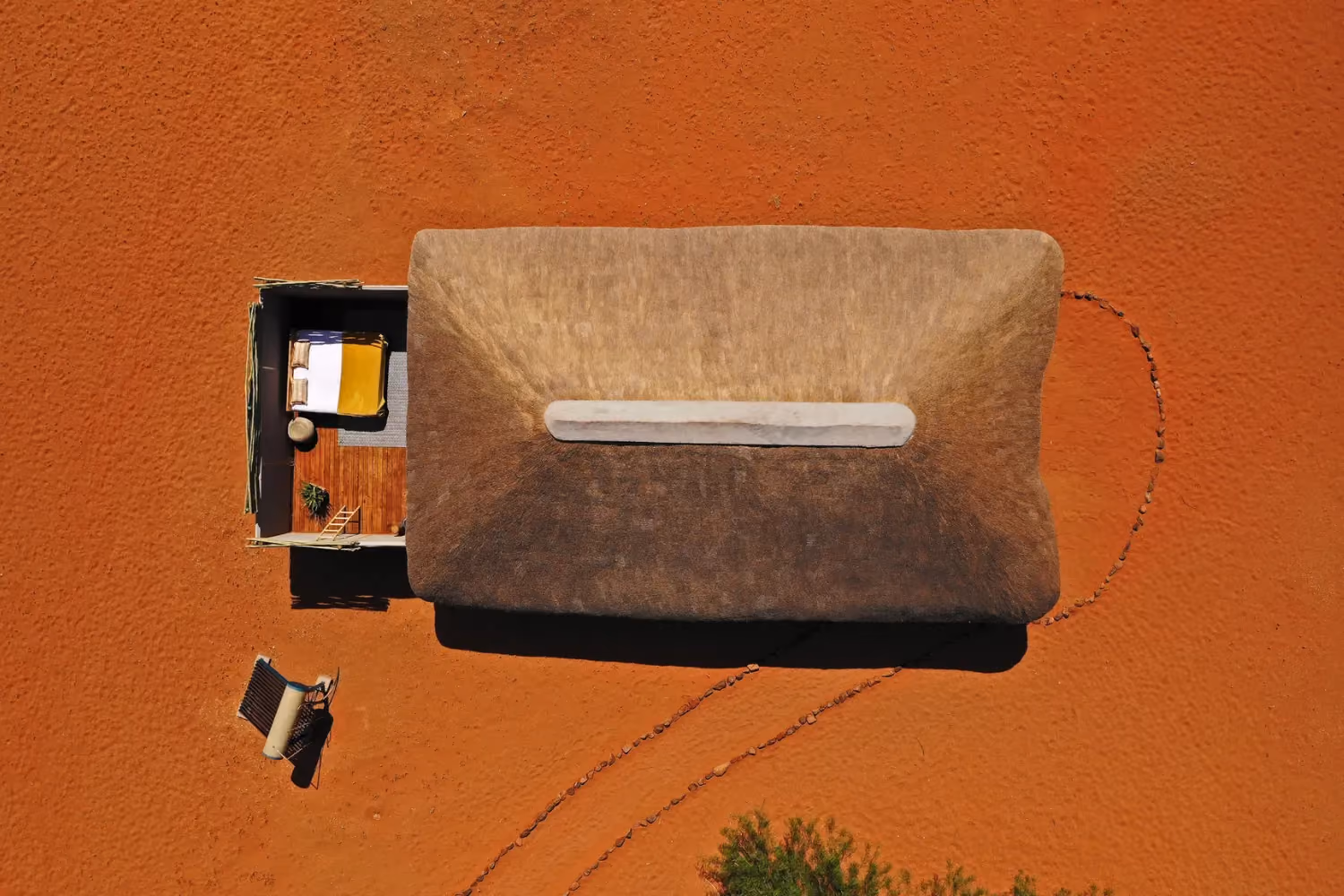 An aerial view of a villa with outside bedroom