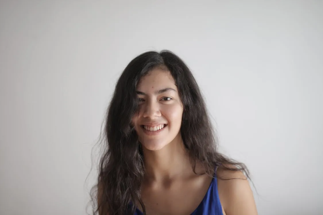 Free Smiling Woman in Blue Top Stock Photo