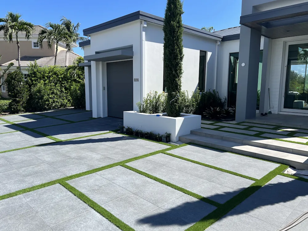 a modern house with a large front yard