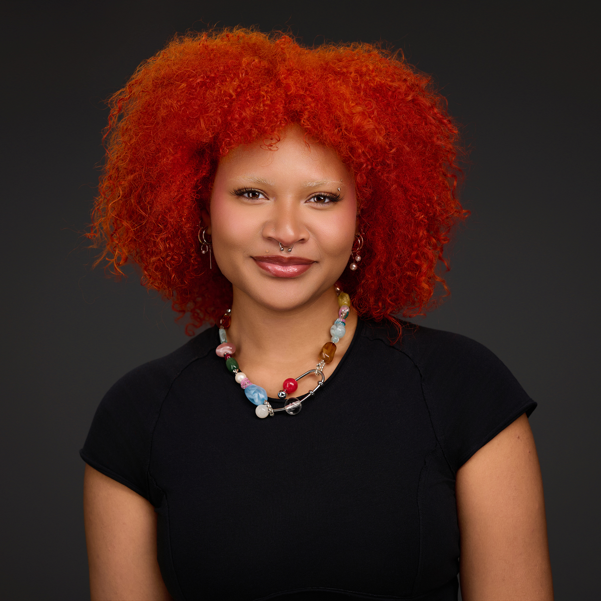 A woman smiling at the camera