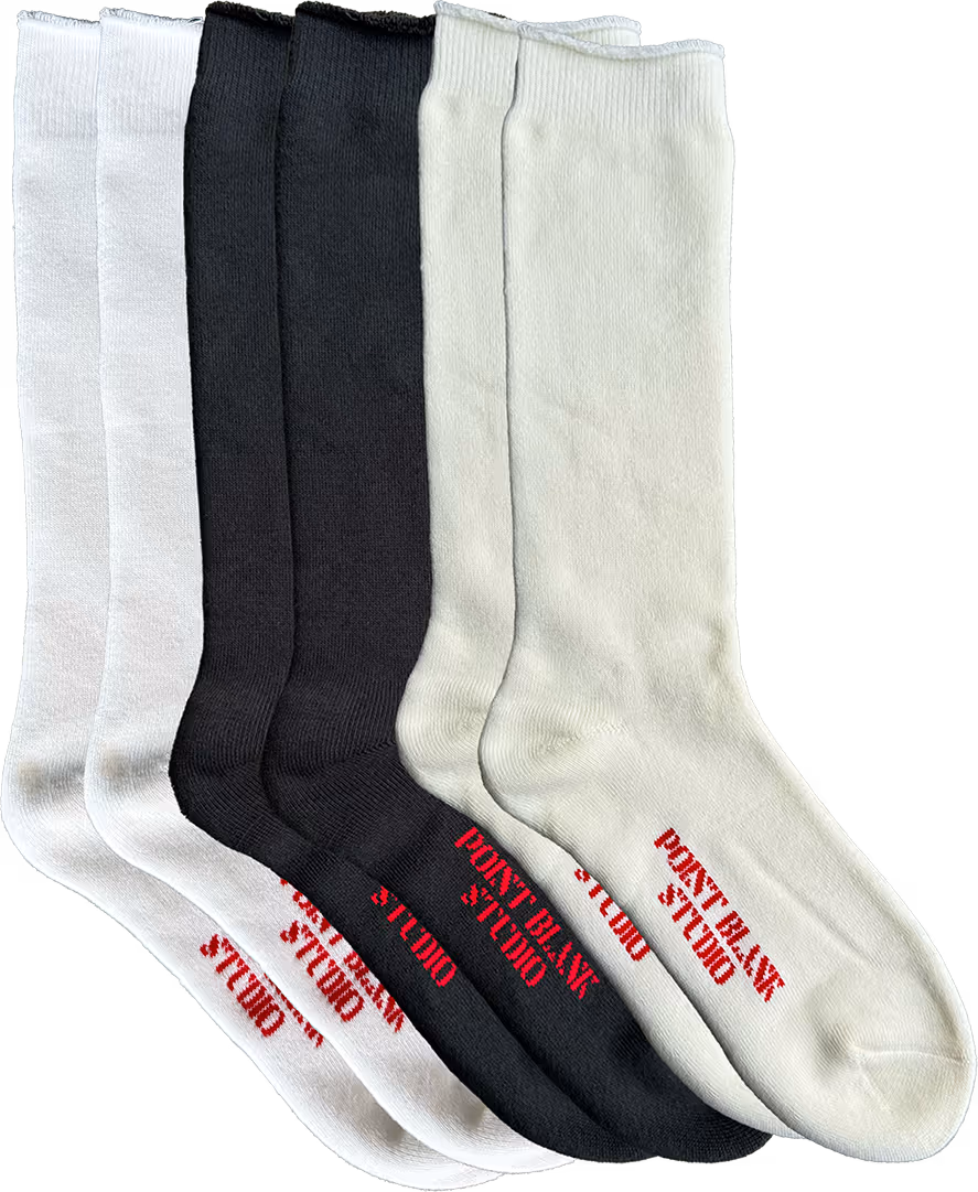 A staple built for styling. These midweight scrunch socks are made from a soft cotton-spandex blend with a tubular knit that naturally stacks. Designed to pair with any shoe, from sneakers to loafers, each pair features a ribbed upper and bold Point Blank Studio logo in red. Comes in a 2-pack: one black, one off-white.