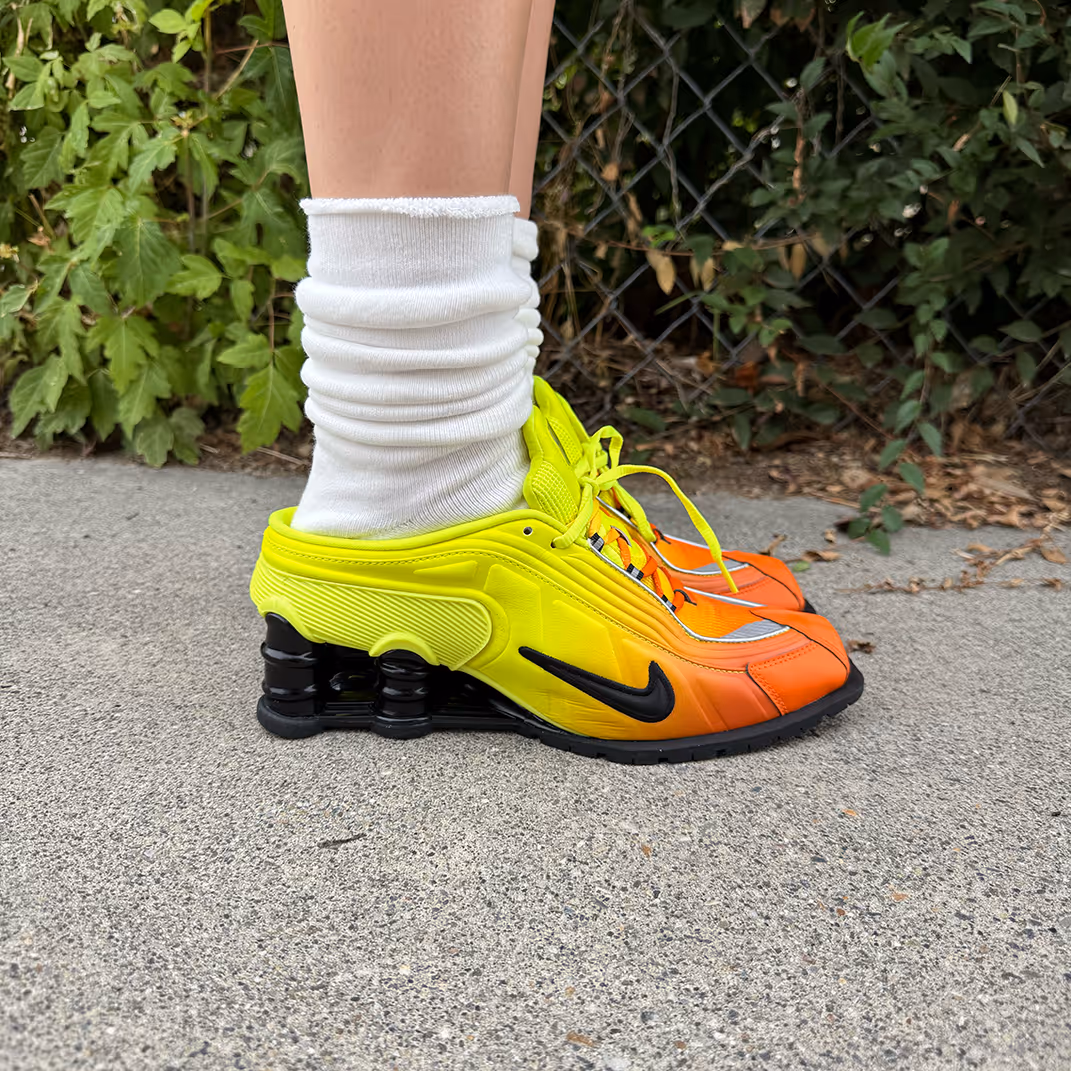 A staple built for styling. These midweight scrunch socks are made from a soft cotton-spandex blend with a tubular knit that naturally stacks. Designed to pair with any shoe, from sneakers to loafers, each pair features a ribbed upper and bold Point Blank Studio logo in red. Comes in a 2-pack: one black, one off-white.