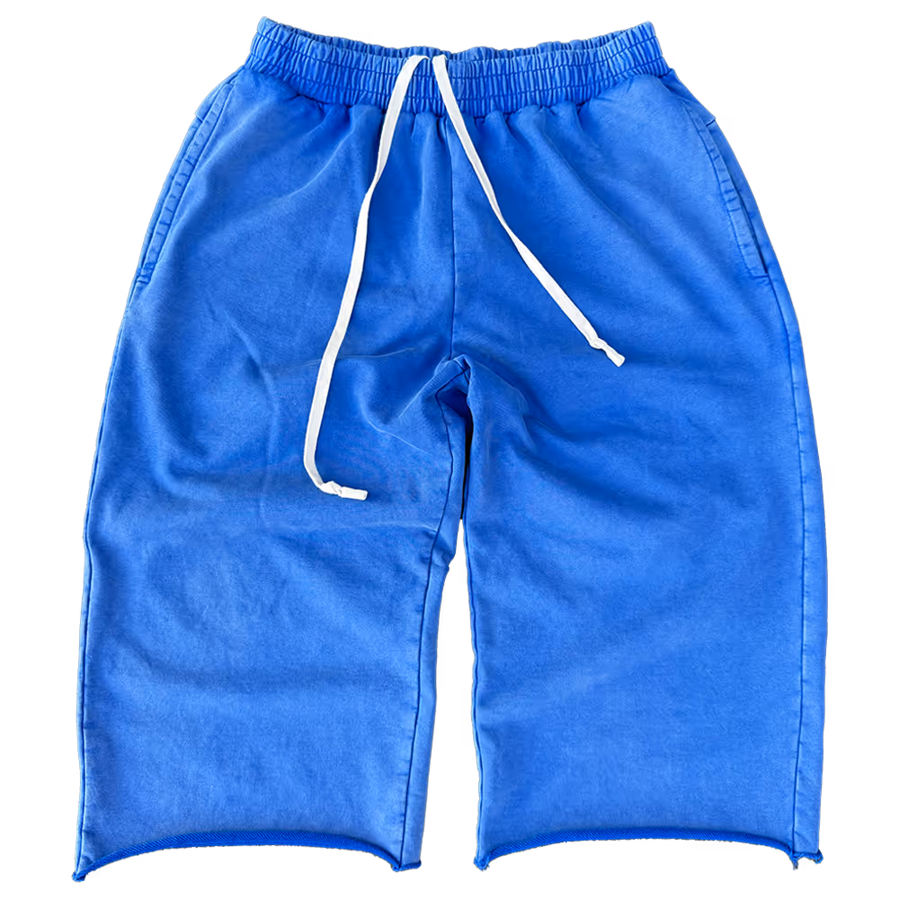 Laid-back luxury in washed blue. These wide-leg, below-the-knee sweatshorts are crafted from heavyweight 400 GSM cotton and finished with a deep vintage mineral wash. Extended drawstrings and a 17-inch inseam add both function and attitude.