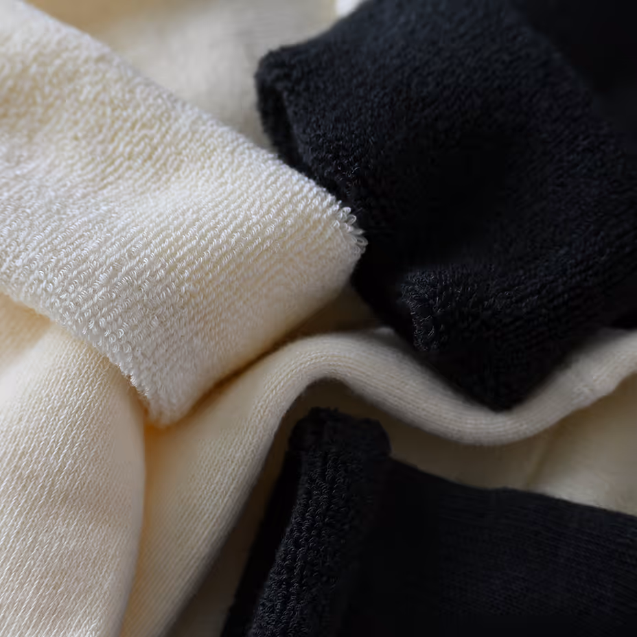 Clean, soft, and essential. The Off-White Scrunch Sock delivers a vintage-inspired stack in a breathable cotton-spandex blend. Ribbed throughout with a tubular shape that hugs the leg and slouches naturally. Finished with a bold red Point Blank Studio logo.