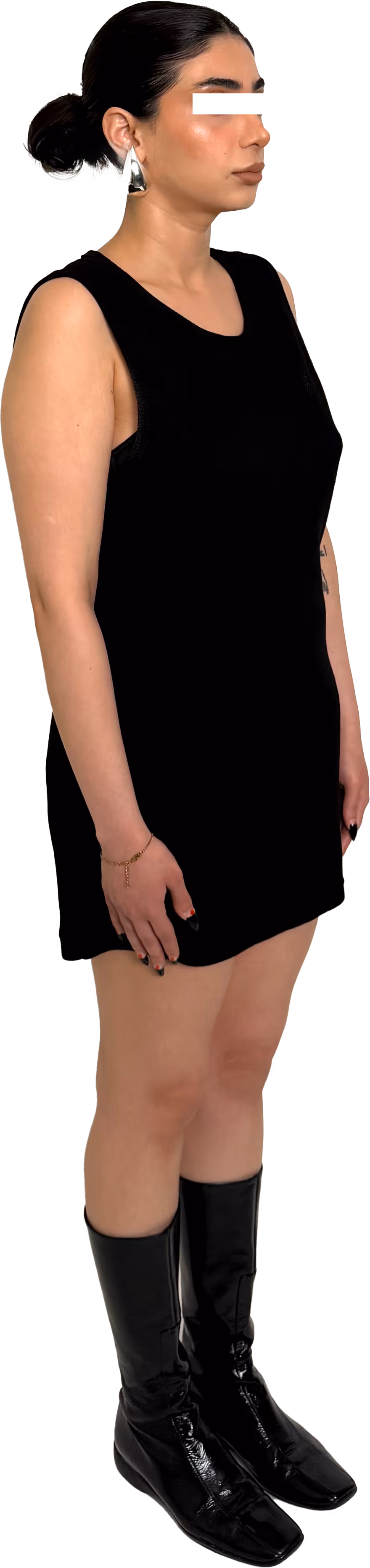 The Waffle Vest combines comfort and style with its waffle knit fabric and snug high collar. Crafted from a blend of cotton and spandex, this versatile tank offers a regular fit with an extended length, perfect for tucking in or creating a scrunch effect. Ideal for layering or wearing solo, it provides a sleek, modern look for everyday wear.