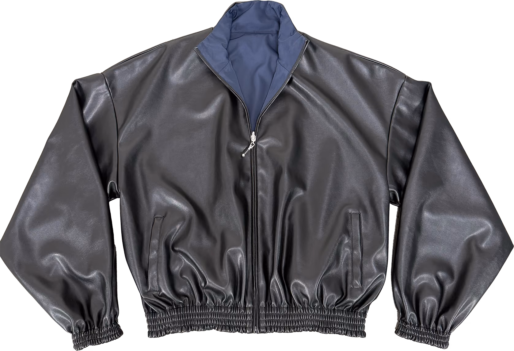 A REVERSIBLE OUTERWEAR JACKET CRAFTED WITH A SUPPLE VEGAN LEATHER EXTERIOR ON ONE SIDE AND A FULLY WATERPROOF NYLON SHELL ON THE OTHER. THE LEATHER FACE FEATURES DEEP HAND POCKETS WITH A HIDDEN SNAP BUTTON CLOSURE. WHILE THE REVERSE SIDE OFFERS ZIP-SECURED POCKETS WITH DURABLE YKK HARDWARE, 3M REFLECTIVE PIPING AND A 3M BACK STITCHED LOGO. RELAXED SILHOUETTE WITH A HIGH COLLAR NECK & TAPERED HEM. ALL ORDERS SHIP IN 2-3 BUSINESS DAYS FROM OUR WAREHOUSE IN UTAH.