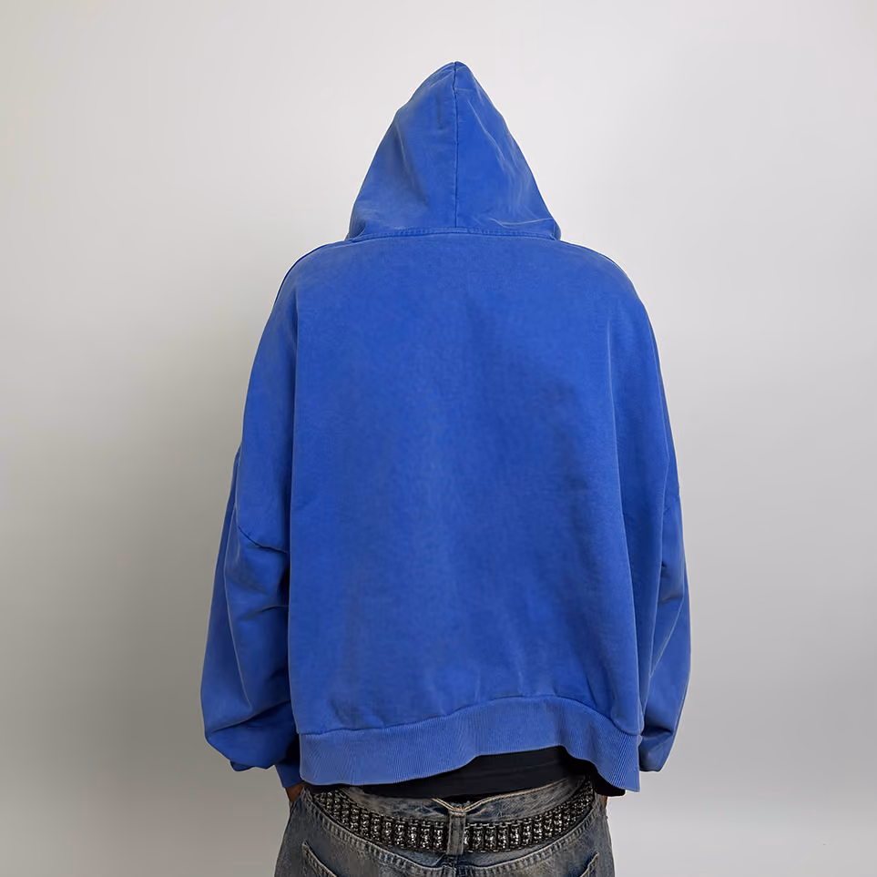 Airy and refined. The Powder Blue Heirloom Zip-Up features a relaxed boxy fit with clouded stack sleeves that add subtle volume. Made from heavyweight cotton and finished with a washed powder tone, it’s equipped with a premium YKK zipper and built for elevated comfort.