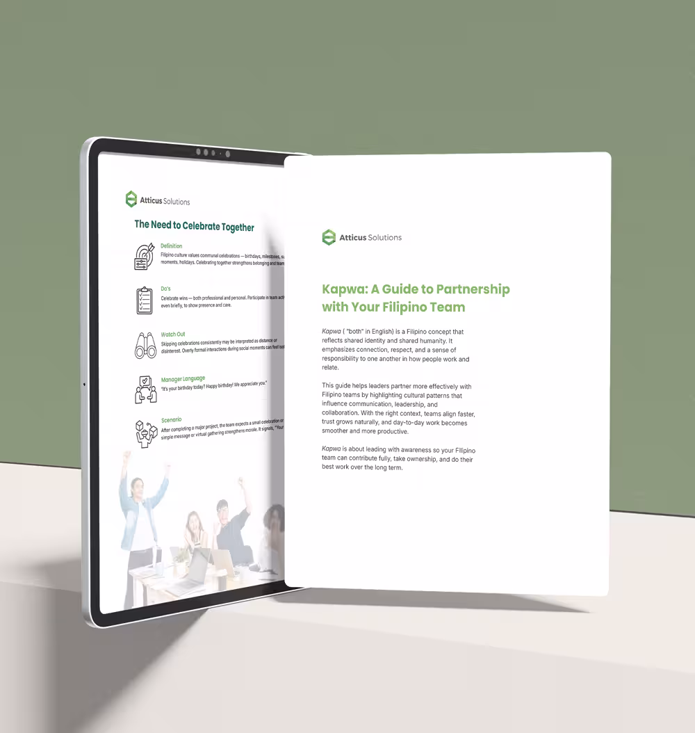 A digital tablet mockup showing 'Kapwa: A Guide to Partnership with Your Filipino Team' by Atticus Solutions, featuring an interior page about the importance of celebrating together and a cultural definition of shared identity