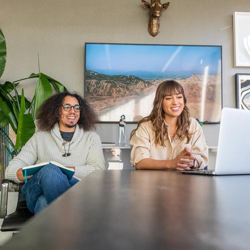 Couple looking at laptop