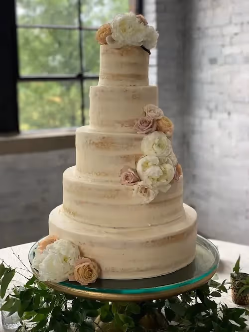 Semi-naked wedding cake by Pen and Pastry.