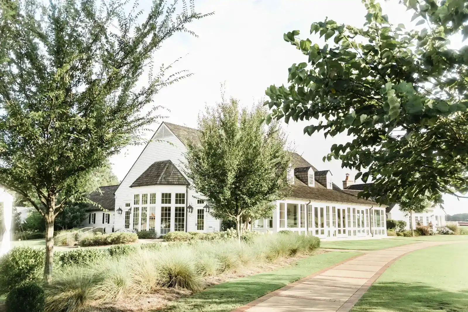 Beautiful wedding venue with a sidewalk and trees