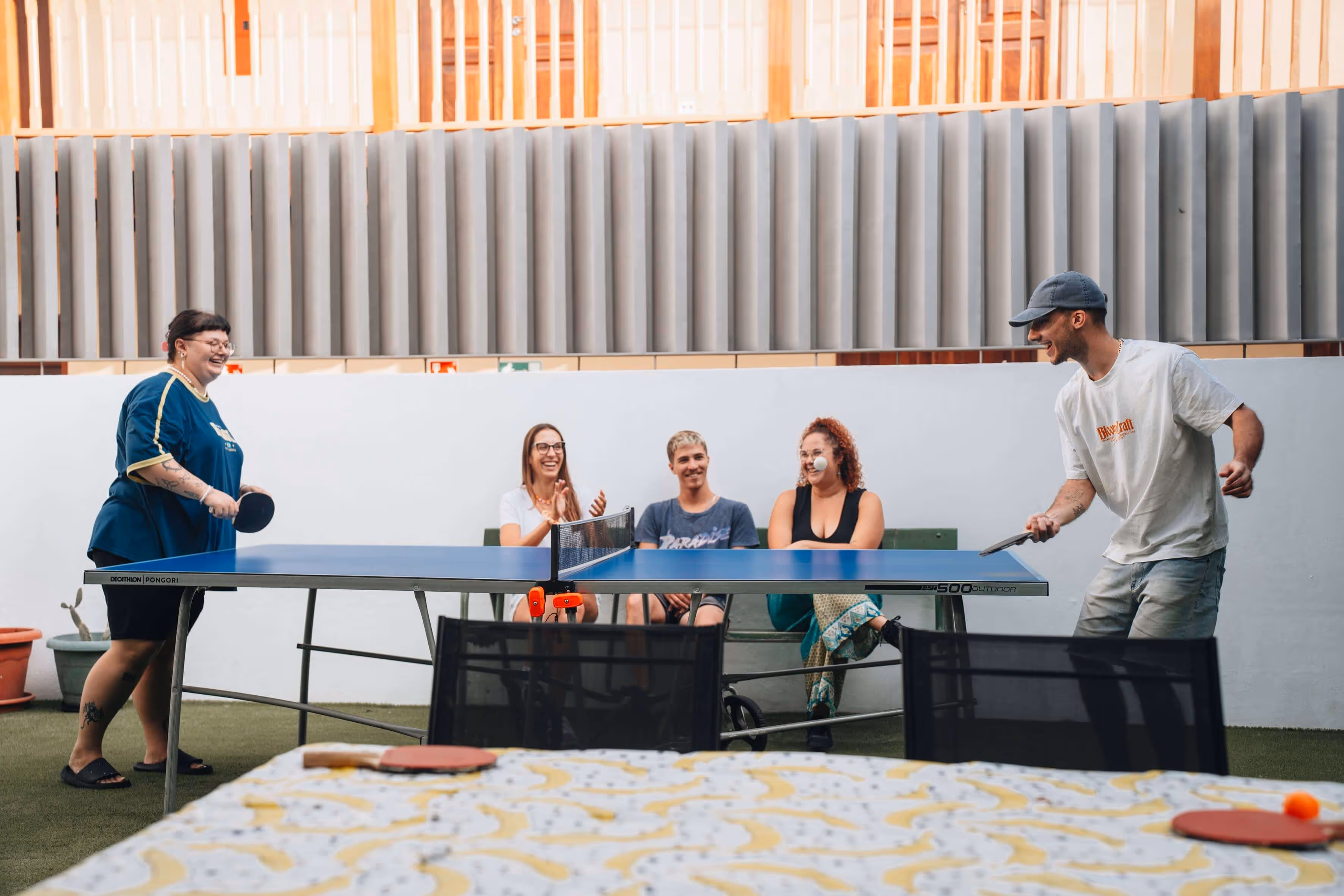 Colivers playing ping pong at Cactus