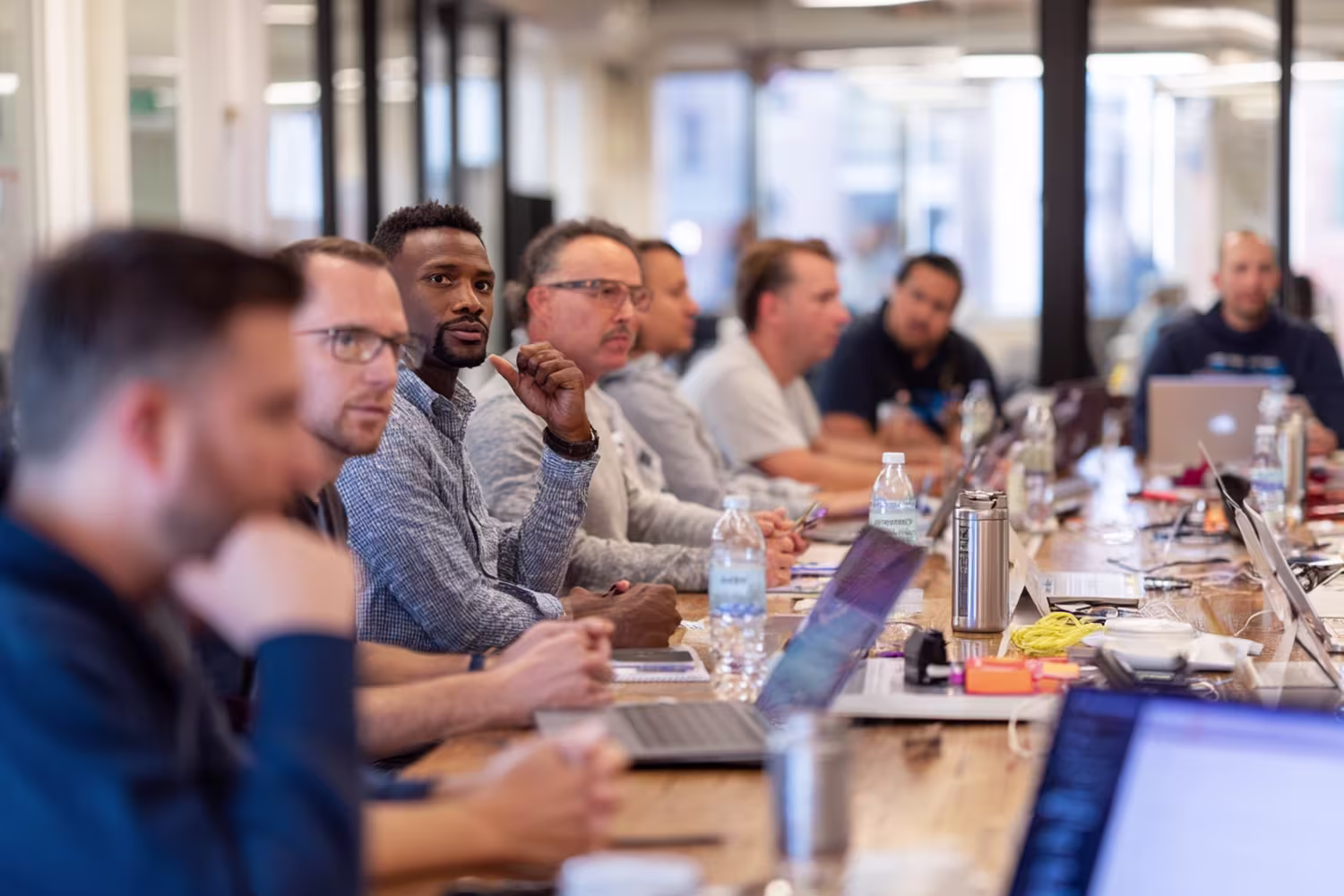 Diverse IT project management meeting