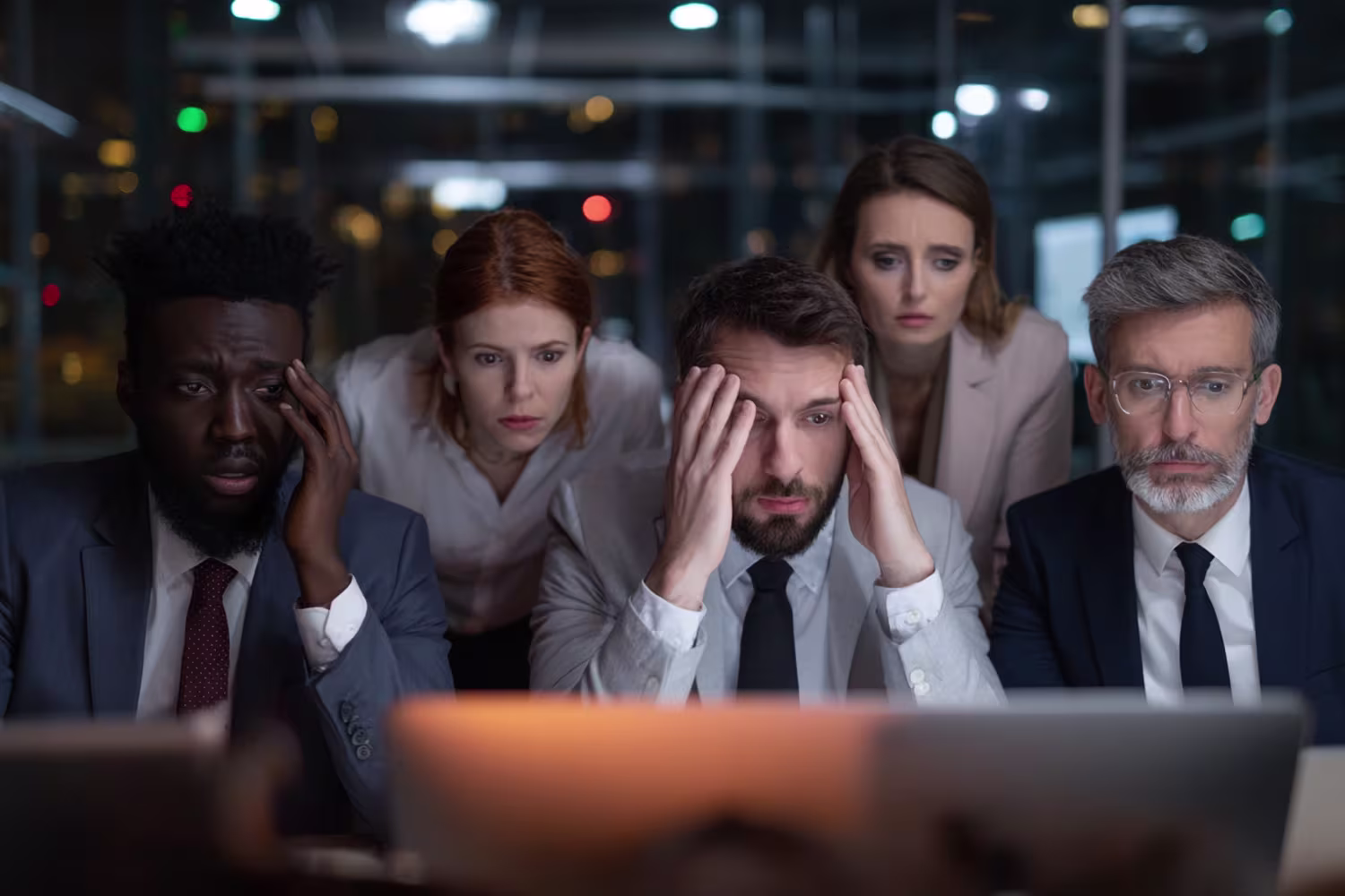 Diverse team troubleshooting IT crisis management