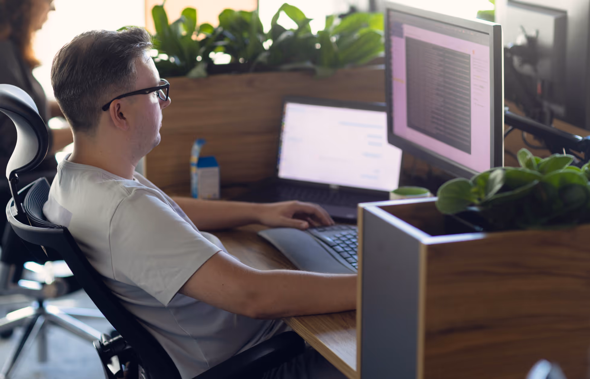 Decerto team member working on computer