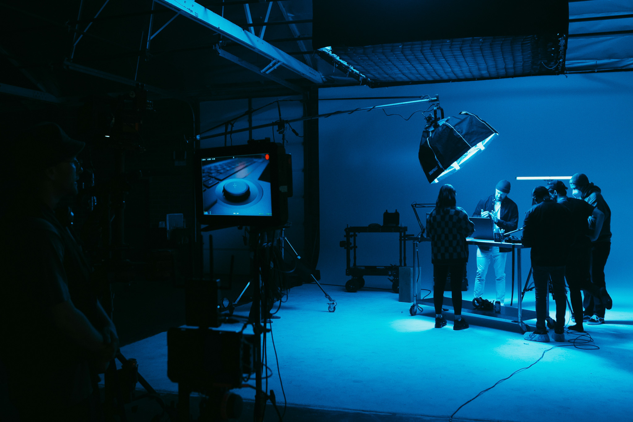Video production crew with professional cameras and equipment