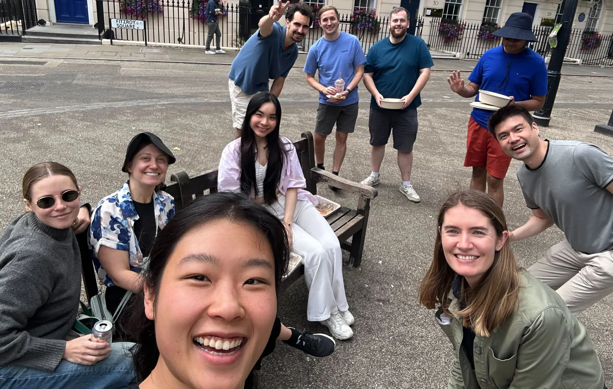 photo of team lunch out in the park