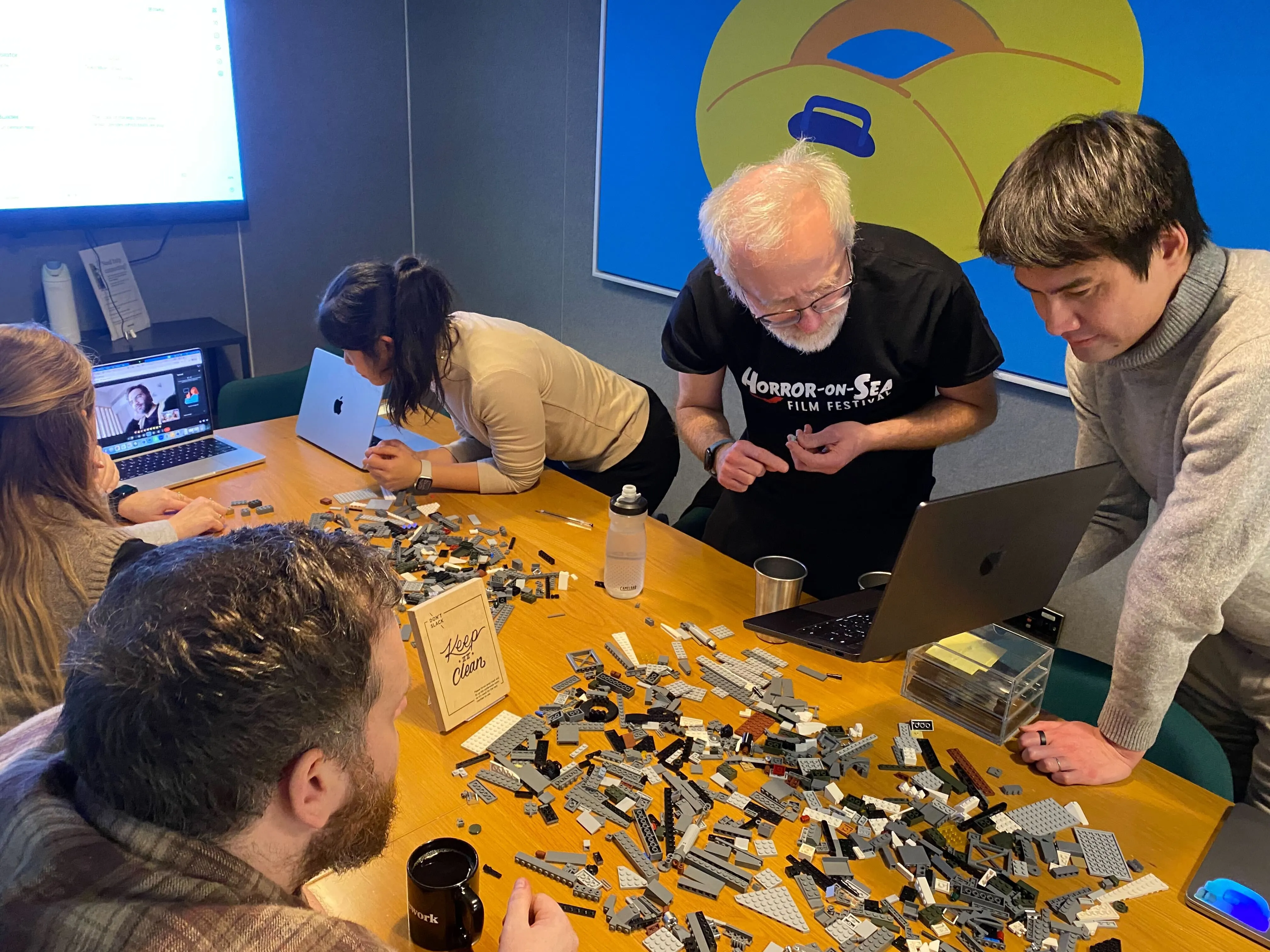 photo of team lunch out in the park