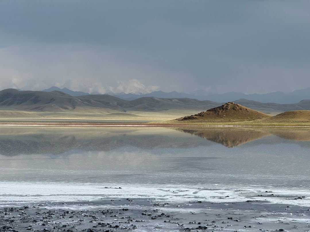 Mountains reflected in the salt lake Tuzkol