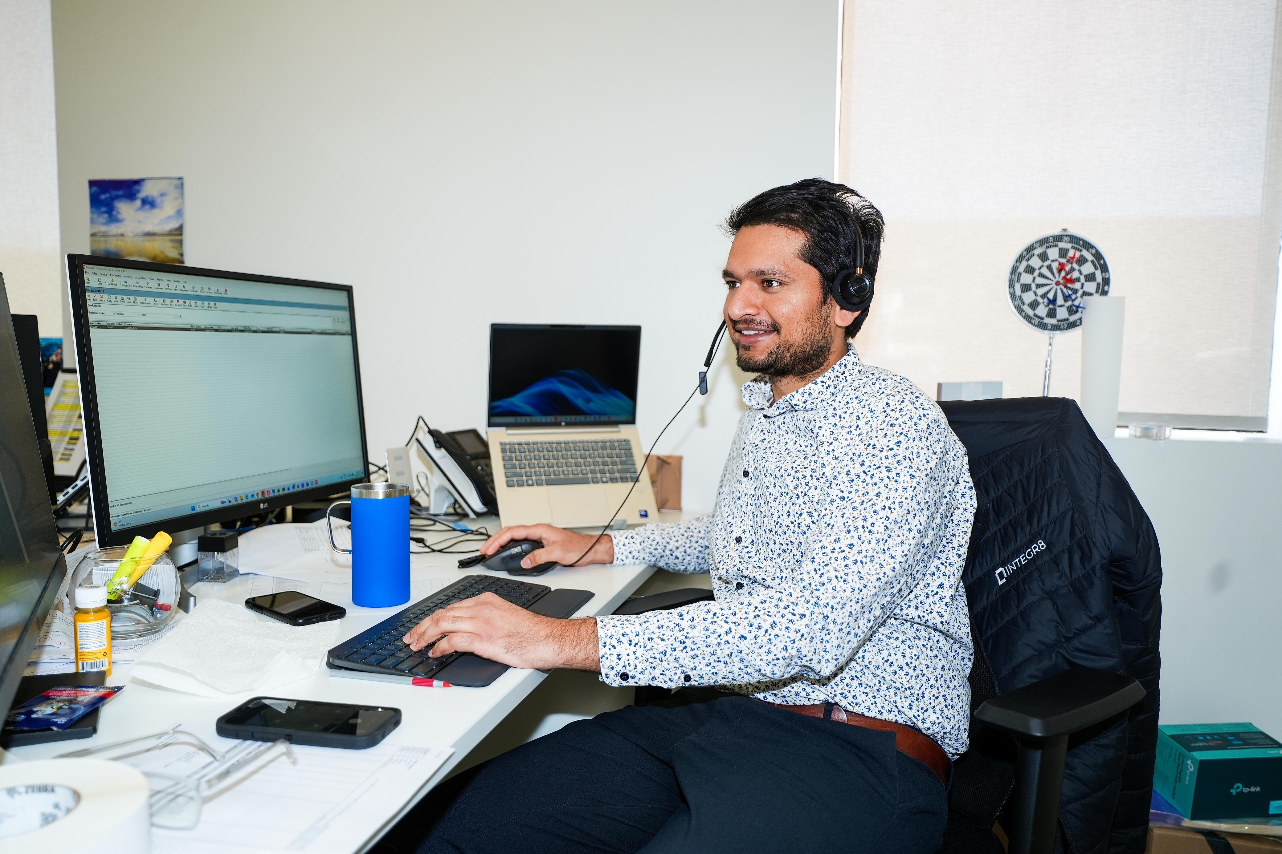 INTEGR8 support specialist helping a customer