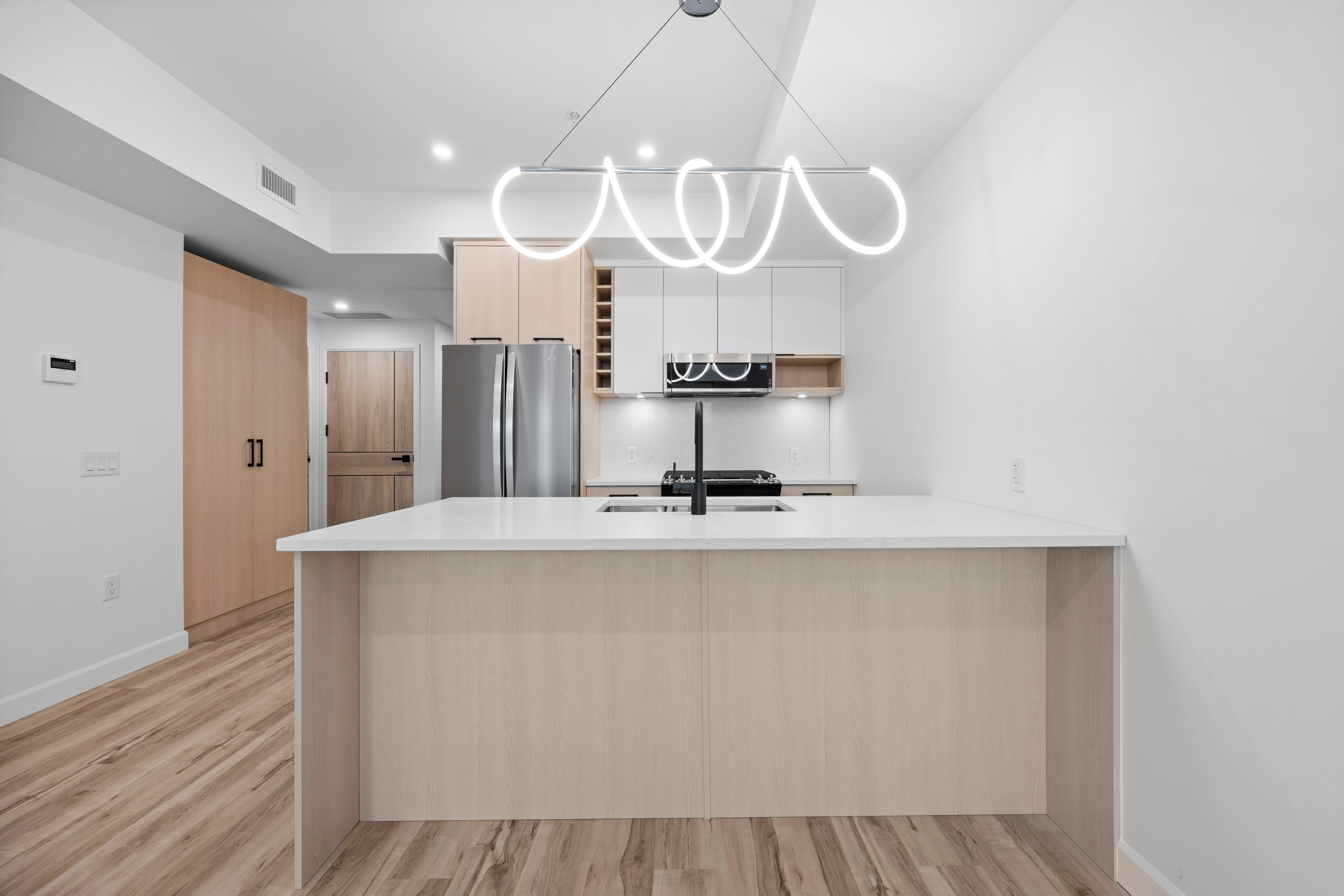 Brand new 1 bed & den at Eminence 