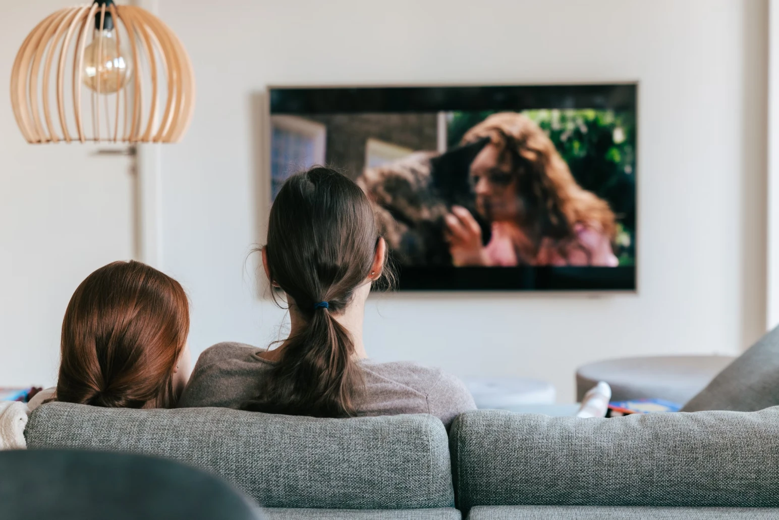 Italian students watching a movie in Italian to improve their Italian listening skills