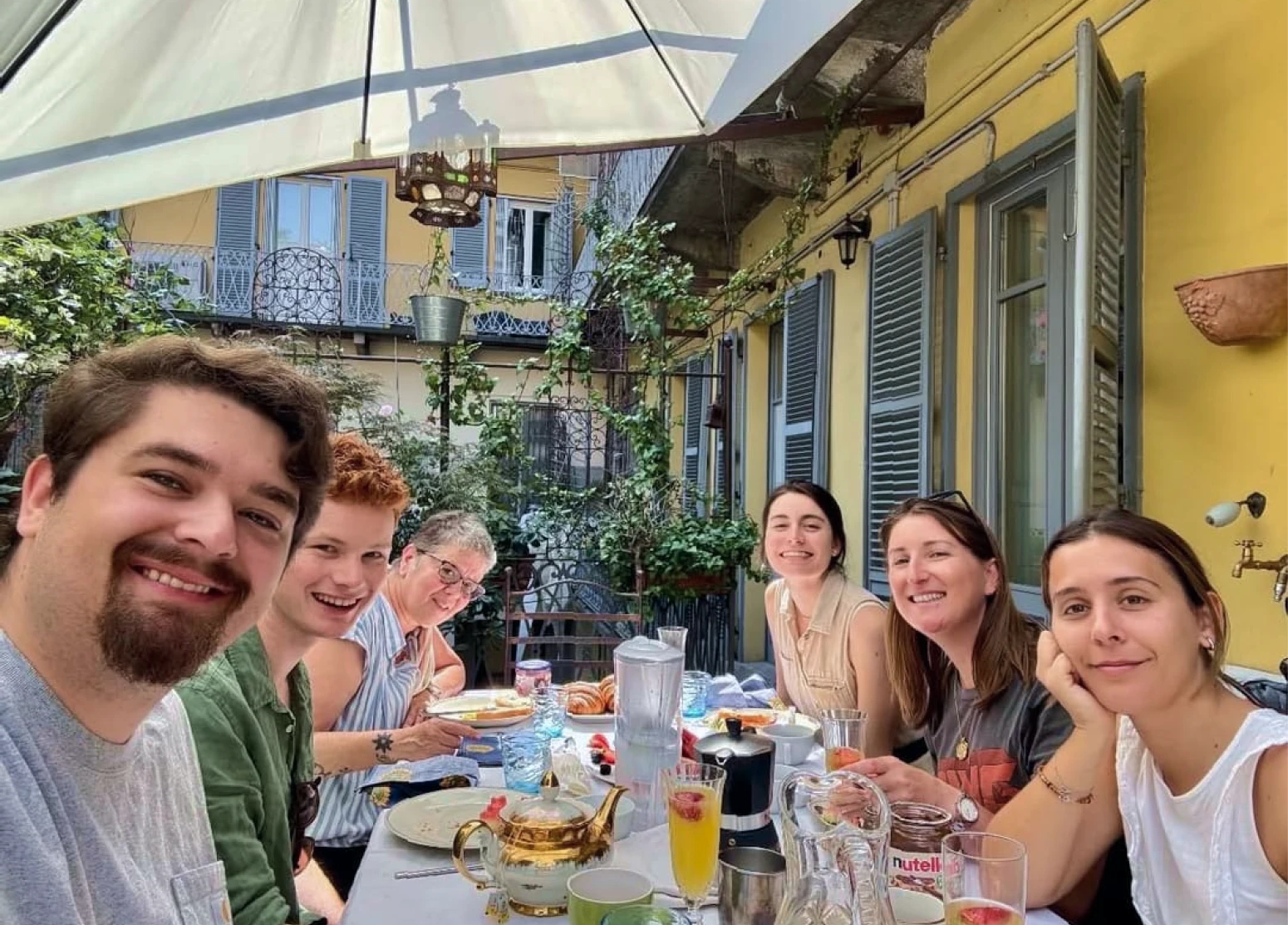 Hamish with the friends he met during his first in-person meetup in Milan